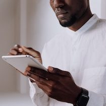 Image of person holding a tablet